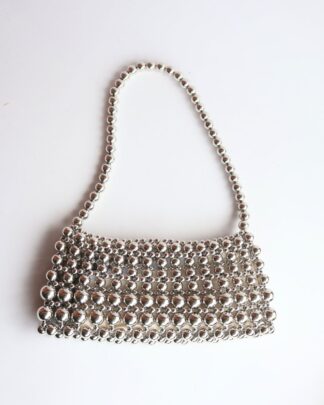 Cartera tejida en balines short