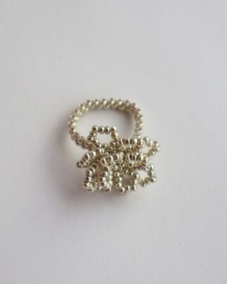 Anillo tejido flor
